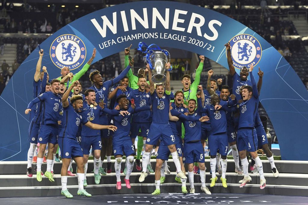 Chelsea supporters celebrate in west London, England after their team won the Champions League final soccer match between Manchester City and Chelsea which is being played at the Dragao stadium in Porto, Portugal, Saturday, May 29, 2021. Chelsea won the match 1-0. (AP Photo/Matt Dunham)