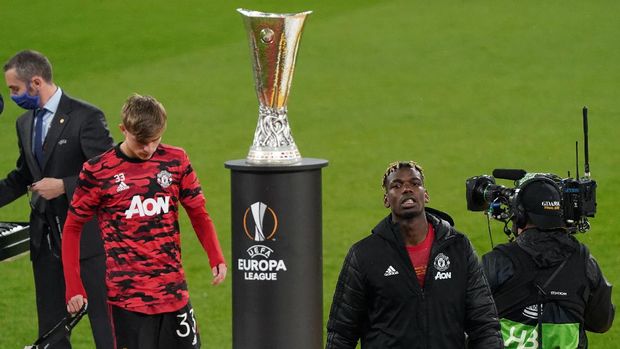 GDANSK, POLAND - MAY 26: Paul Pogba of Manchester United looks dejected after receiving his runners-up medal during the UEFA Europa League Final between Villarreal CF and Manchester United at Gdansk Arena on May 26, 2021 in Gdansk, Poland. (Photo by Janek Skarzynski - Pool/Getty Images)
