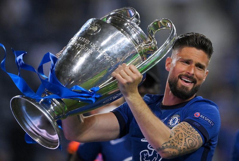 Olivier Giroud PORTO, PORTUGAL - MAY 29: Olivier Giroud of Chelsea celebrates with the Champions League Trophy following their team's victory in the UEFA Champions League Final between Manchester City and Chelsea FC at Estadio do Dragao on May 29, 2021 in Porto, Portugal. (Photo by David Ramos/Getty Images)