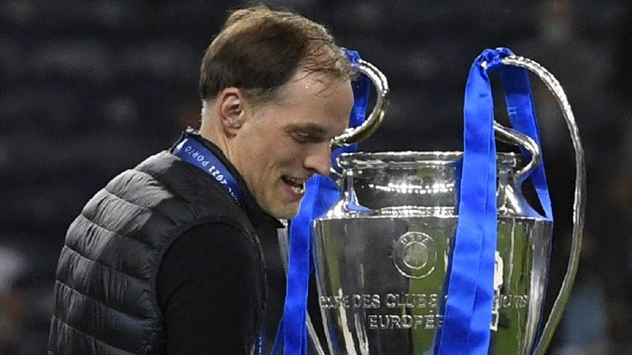 Chelseas head coach Thomas Tuchel walks by the trophy at the end of the Champions League final soccer match between Manchester City and Chelsea at the Dragao Stadium in Porto, Portugal, Saturday, May 29, 2021. Chelsea won the match 1-0. (Pierre Philippe Marcou/Pool via AP)