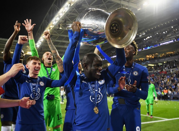 N'Golo Kante PORTO, PORTUGAL - MAY 29: Ngolo Kante of Chelsea celebrates with the Champions League Trophy following their team's victory during the UEFA Champions League Final between Manchester City and Chelsea FC at Estadio do Dragao on May 29, 2021 in Porto, Portugal. (Photo by David Ramos/Getty Images)