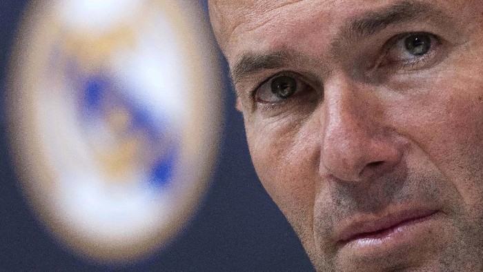FILE - in this Thursday, May 31, 2018 file photo Zinedine Zidane listens to the questions of journalists during a press conference in Madrid, Spain. Zinedine Zidane is again stepping down as Real Madrid coach. The club says the Frenchman is leaving his job. It comes four days after a season in which Madrid failed to win a title for the first time in more than a decade. (AP Photo/Borja B. Hojas, File)