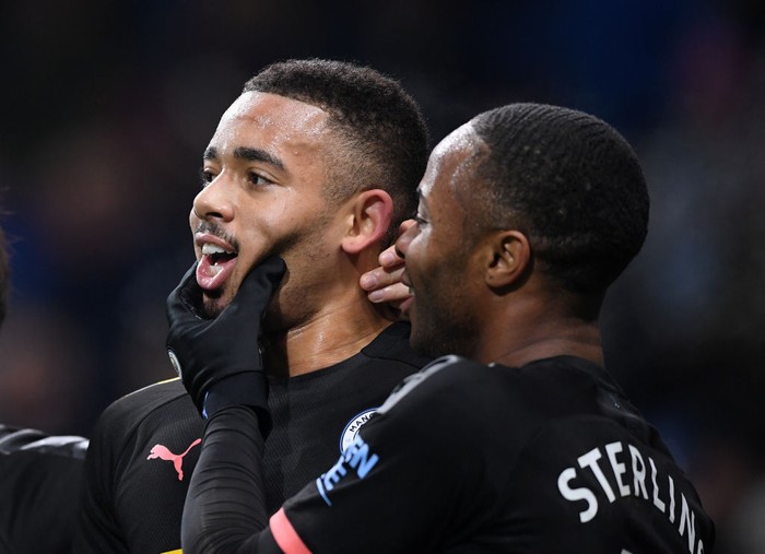 BURNLEY, ENGLAND - DECEMBER 03: City striker Gabriel Jesus is congratulated by Raheem Sterling after scoring the first goal during the Premier League match between Burnley FC and Manchester City at Turf Moor on December 03, 2019 in Burnley, United Kingdom. (Photo by Stu Forster/Getty Images)
