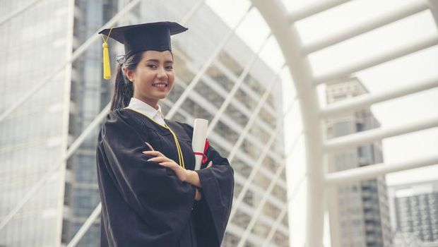 Graduate Student and Success Education in University Concept. Happy Asian student woman graduate diploma and MBA degree in asian college.