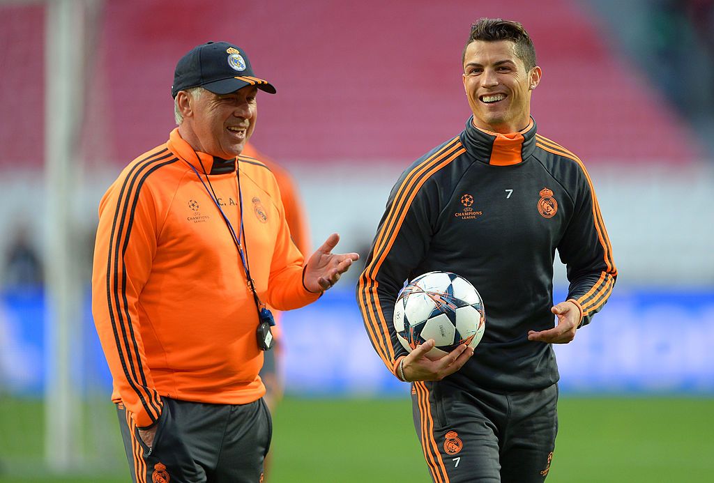 LISBON, PORTUGAL - MAY 23:  Head Coach, Carlo Ancelotti of Real Madrid speaks with Cristiano Ronaldo of Real Madrid during a Real Madrid training session ahead of the UEFA Champions League Final against Club Atletico de Madrid at Estadio da Luz on May 23, 2014 in Lisbon, Portugal.  (Photo by Michael Regan/Getty Images)