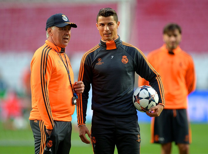 LISBON, PORTUGAL - MAY 23:  Head Coach, Carlo Ancelotti of Real Madrid speaks with Cristiano Ronaldo of Real Madrid during a Real Madrid training session ahead of the UEFA Champions League Final against Club Atletico de Madrid at Estadio da Luz on May 23, 2014 in Lisbon, Portugal.  (Photo by Michael Regan/Getty Images)