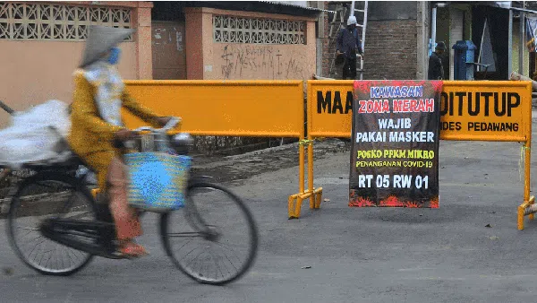 Foto Populer Sepekan: Kudus Dihantam Corona-Vaksin Sinovac Disetujui WHO