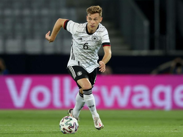 INNSBRUCK, AUSTRIA - JUNE 02: Joshua Kimmich of Germany runs with the ball during the international friendly match between Germany and Denmark at Tivoli Stadion on June 02, 2021 in Innsbruck, Austria. (Photo by Alexander Hassenstein/Getty Images)