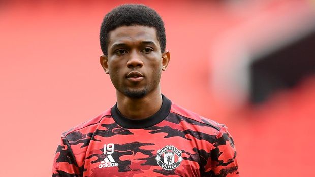 MANCHESTER, ENGLAND - MAY 11: Amad Diallo of Manchester United warms up prior to the Premier League match between Manchester United and Leicester City at Old Trafford on May 11, 2021 in Manchester, England. Sporting stadiums around the UK remain under strict restrictions due to the Coronavirus Pandemic as Government social distancing laws prohibit fans inside venues resulting in games being played behind closed doors.  (Photo by Michael Regan/Getty Images)