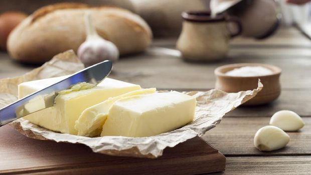 butter knife , bread , garlic and milk , breakfast in the countryside