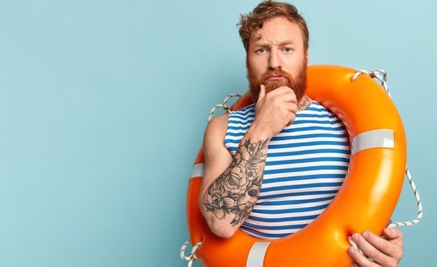 Man with Lifebuoy | Freepik.com