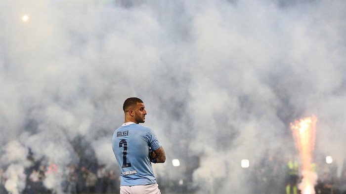 Manchester Citys English defender Kyle Walker reacts at the end of the UEFA Champions League final football match between Manchester City and Chelsea FC at the Dragao stadium in Porto on May 29, 2021. (Photo by Jose Coelho / POOL / AFP)