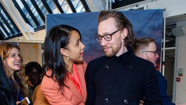 LONDON, ENGLAND - APRIL 07:   (L-R) Charlie Cox, Zawe Ashton and Tom Hiddleston present the Best Actress award on stage during The Olivier Awards 2019 with Mastercard at the Royal Albert Hall on April 07, 2019 in London, England. (Photo by Jeff Spicer/Getty Images)