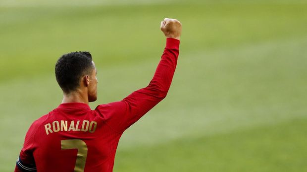 Portugal's Cristiano Ronaldo celebrates after scoring his side's second goal during the international friendly soccer match between Portugal and Israel at the Alvalade stadium in Lisbon, Wednesday, June 9, 2021. (AP Photo/Armando Franca)