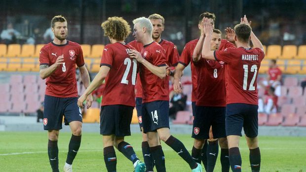 Czech Republic's players celebrate after Czech Republic's forward Patrik Schick (hidden) scored his team's first goal during the friendly football match between Czech Republic and Albania in Prague, Czech Republic, on June 8, 2021, in preparation for the UEFA European Championships. (Photo by Michal Cizek / AFP)