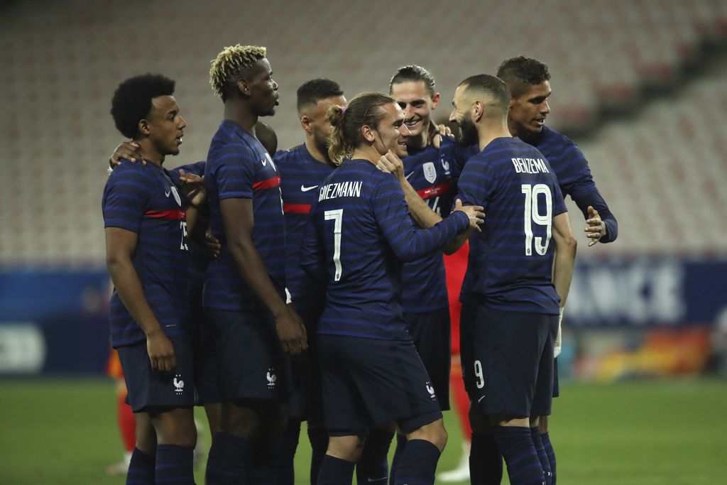 France's Antoine Griezmann, center, celebrates after scoring his side's second goal with his teammates during the international friendly soccer match between France and Wales at the Allianz Riviera stadium in Nice, France, Wednesday, June 2, 2021. (AP Photo/Daniel Cole)