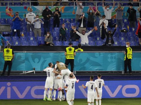 Italy players celebrate after Italy's Ciro Immobile scored his side's second goal during the Euro 2020 soccer championship group A match between Turkey and Italy at the Rome Olympic stadium, Friday, June 11, 2021. (AP Photo/Andrew Medichini, Pool)