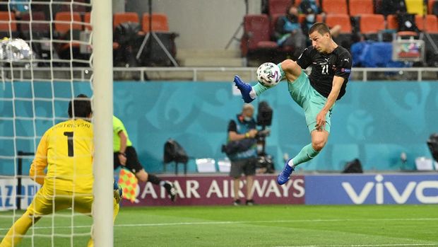 Soccer Football - Euro 2020 - Group C - Austria v North Macedonia - National Arena, Bucharest, Romania - June 13, 2021 Austria's Stefan Lainer scores their first goal Pool via REUTERS/Justin Setterfield