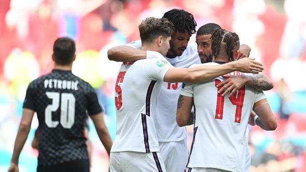 Soccer Football - Euro 2020 - Group D - England v Croatia - Wembley Stadium, London, Britain - June 13, 2021 England's John Stones, Tyrone Mings, Kyle Walker and Kalvin Phillips celebrate after the match Pool via REUTERS/Andy Rain