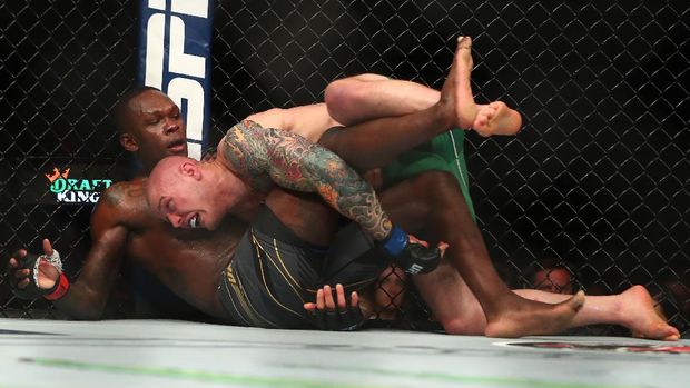 Jun 12, 2021; Glendale, Arizona, USA; Marvin Vettori pins Israel Adesanya to the mat during UFC 263 at Gila River Arena. Mandatory Credit: Mark J. Rebilas-USA TODAY Sports