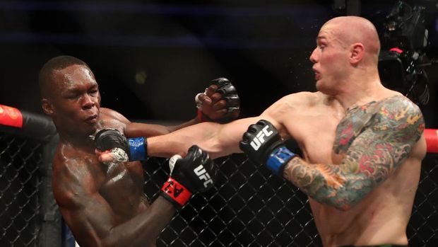 Jun 12, 2021; Glendale, Arizona, USA; Marvin Vettori lands a hit against Israel Adesanya during UFC 263 at Gila River Arena. Mandatory Credit: Mark J. Rebilas-USA TODAY Sports