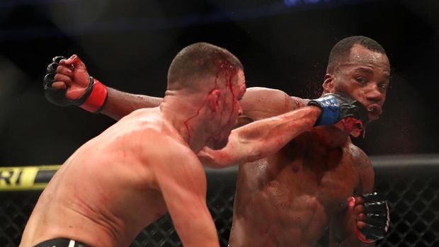 Jun 12, 2021; Glendale, Arizona, USA; Nate Diaz lands a hit against Leon Edwards during UFC 263 at Gila River Arena. Mandatory Credit: Mark J. Rebilas-USA TODAY Sports