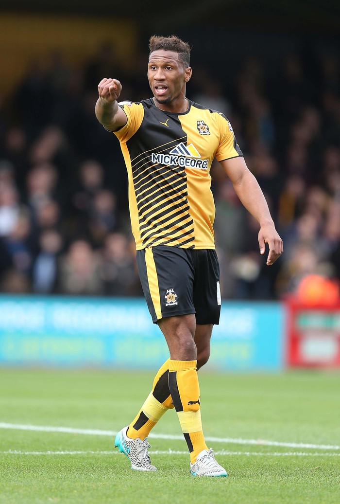 Alie Sesay CAMBRIDGE, CAMBRIDGESHIRE - OCTOBER 17: Alie Sesay of Cambridge United in action during the Sky Bet League Two match between Cambridge United and Northampton Town at Abbey Stadium on October 17, 2015 in Cambridge, Cambridgeshire. (Photo by Pete Norton/Getty Images)