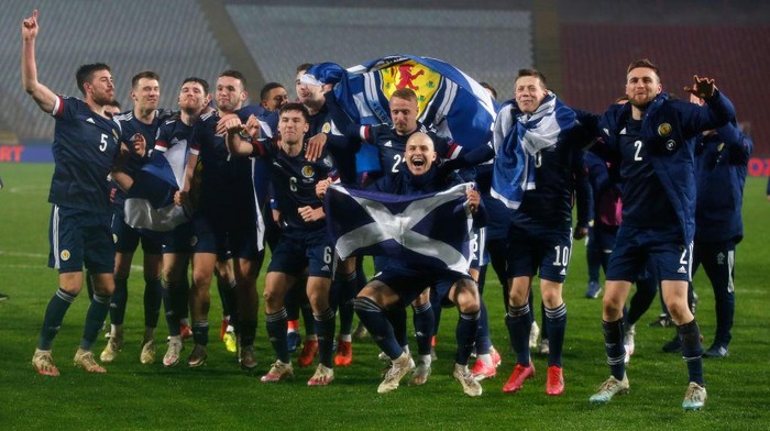 BELGRADE, SERBIA - NOVEMBER 12: The Scotland side celebrate at the final whistle during the UEFA EURO 2020 Play-Off Final between Serbia and Scotland at Rajko Mitic Stadium on November 12, 2020 in Belgrade, Serbia. Football Stadiums around Europe remain empty due to the Coronavirus Pandemic as Government social distancing laws prohibit fans inside venues resulting in fixtures being played behind closed doors. (Photo by Srdjan Stevanovic/Getty Images)
