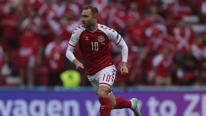 Denmarks Christian Eriksen runs during the Euro 2020 soccer championship group B match between Denmark and Finland at Parken stadium in Copenhagen, Denmark, Saturday, June 12, 2021. Eriksen collapsed on the pitch and received medical assistance before being taken to hospital. (Wolfgang Rattay/Pool via AP)