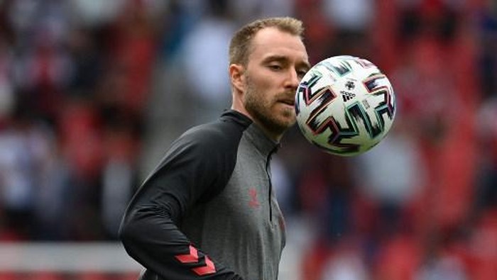 Denmarks midfielder Christian Eriksen warms up before the UEFA EURO 2020 Group B football match between Denmark and Finland at the Parken Stadium in Copenhagen on June 12, 2021. (Photo by Jonathan NACKSTRAND / various sources / AFP)