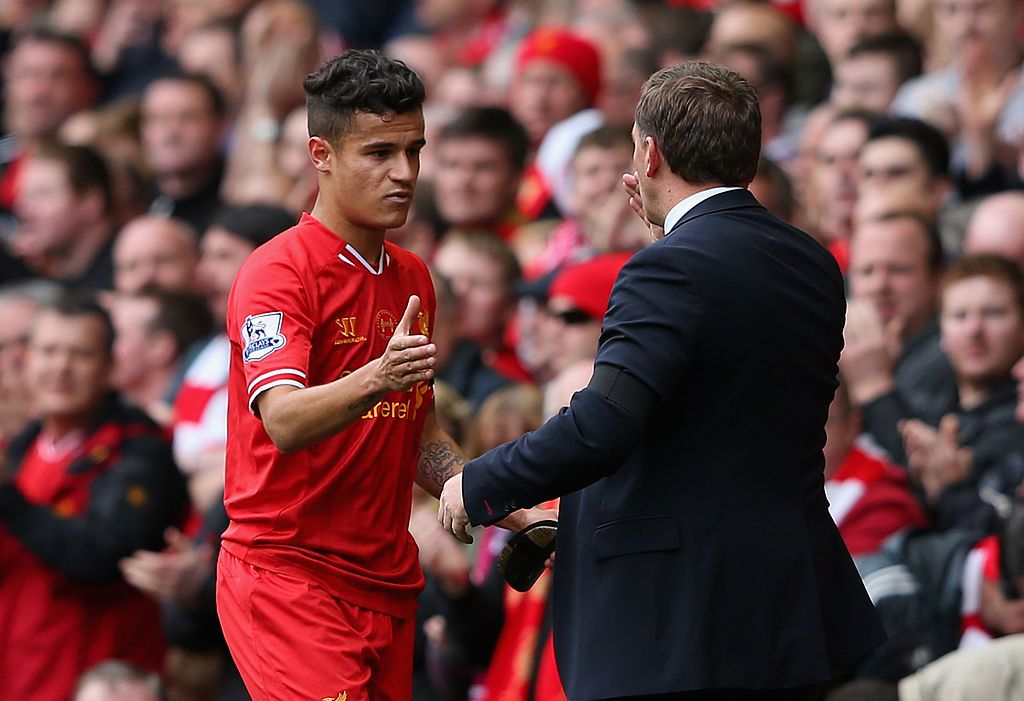 LIVERPOOL, ENGLAND - APRIL 13:  Liverpool Manager Brendan Rodgers congratulates Philippe Coutinho as he is substituted during the Barclays Premier League match between Liverpool and Manchester City at Anfield on April 13, 2014 in Liverpool, England.  (Photo by Alex Livesey/Getty Images)