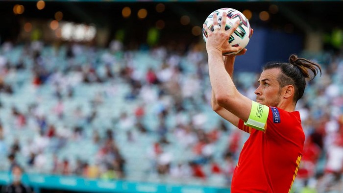 BAKU, AZERBAIJAN - JUNE 12: Gareth Bale of Wales prepares to take a throw in during the UEFA Euro 2020 Championship Group A match between Wales and Switzerland at the Baku Olympic Stadium on June 12, 2021 in Baku, Azerbaijan. (Photo by Valentin Ogirenko - Pool/Getty Images)