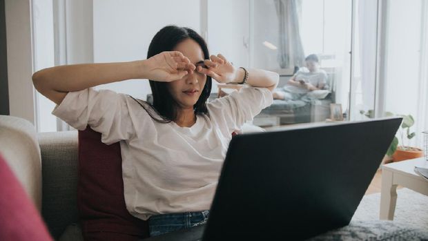 office syndrome: Officer woman working at home with bag ergonomic and tired, Bangkok Thailand