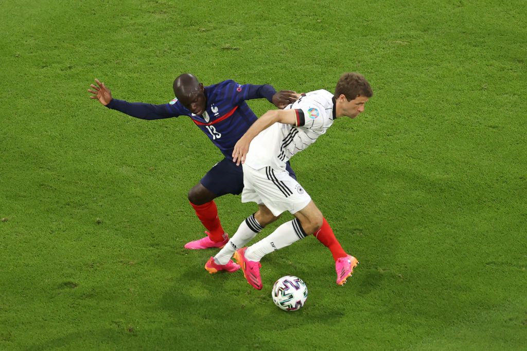 MUNICH, GERMANY - JUNE 15: Paul Pogba of France battles for possession with Toni Kroos of Germany during the UEFA Euro 2020 Championship Group F match between France and Germany at Football Arena Munich on June 15, 2021 in Munich, Germany. (Photo by Matthias Hangst/Getty Images)