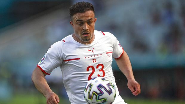 Switzerland's Xherdan Shaqiri eyes the ball during the Euro 2020 soccer championship group A match between Wales and Switzerland, at the Baku Olympic stadium, in Baku, Azerbaijan, Saturday, June 12, 2021. (Ozan Kose, Pool via AP)