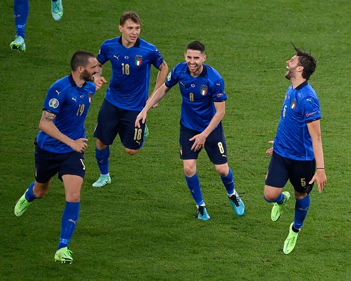 ROME, ITALY - JUNE 16: Manuel Locatelli of Italy celebrates with Leonardo Bonucci, ita18a after scoring their sides second goal during the UEFA Euro 2020 Championship Group A match between Italy and Switzerland at Olimpico Stadium on June 16, 2021 in Rome, Italy. (Photo by Riccardo Antimiani - Pool/UEFA via Getty Images)