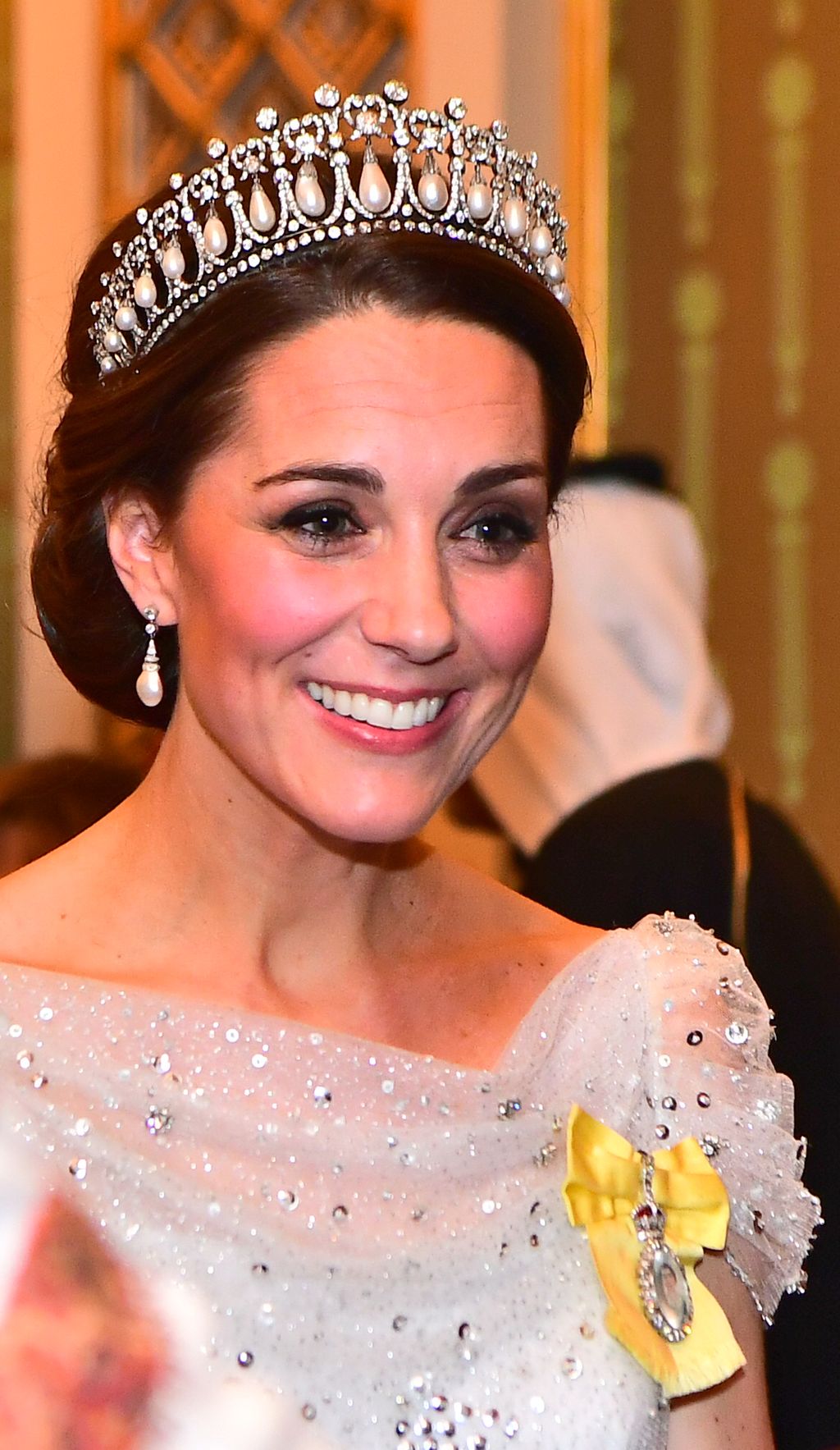 LONDON, ENGLAND - DECEMBER 04:   Catherine, Duchess of Cambridge greets guests at an evening reception for members of the Diplomatic Corps at Buckingham Palace on December 04, 2018 in London, England. Approximately 7,500 military personnel are currently serving overseas at Christmas.  (Photo by Victoria Jones - WPA Pool/Getty Images)