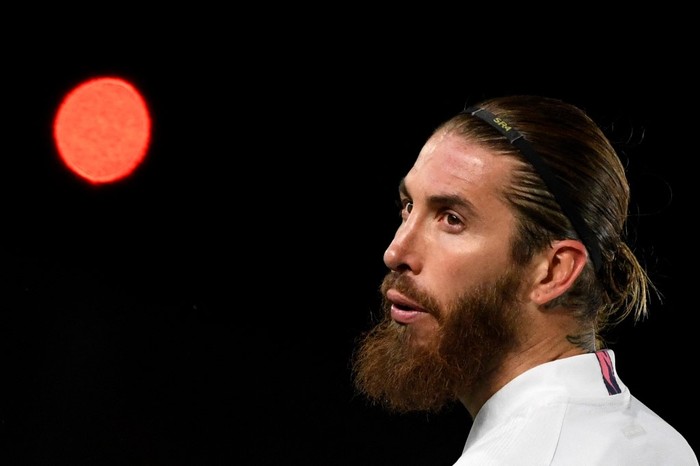 (FILES) In this file photo taken on March 16, 2021 Real Madrids Spanish defender Sergio Ramos looks on during the UEFA Champions League round of 16 second leg football match between Real Madrid CF and Atalanta at the Alfredo di Stefano stadium in Valdebebas, on the outskirts of Madrid. - Legendary captain Sergio Ramos is to leave Real Madrid after a glittering, trophy-laden career spanning 671 games and 16 seasons, the club announced on June 16, 2021. (Photo by PIERRE-PHILIPPE MARCOU / AFP)