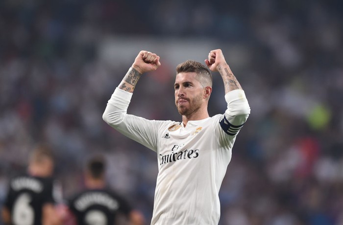 Sergio Ramos MADRID, SPAIN - SEPTEMBER 01: Sergio Ramos of Real Madrid celebrates after scoring his team's 4th goal from the penalty spot during the La Liga match between Real Madrid CF and CD Leganes at Estadio Santiago Bernabeu on September 1, 2018 in Madrid, Spain. (Photo by Denis Doyle/Getty Images)