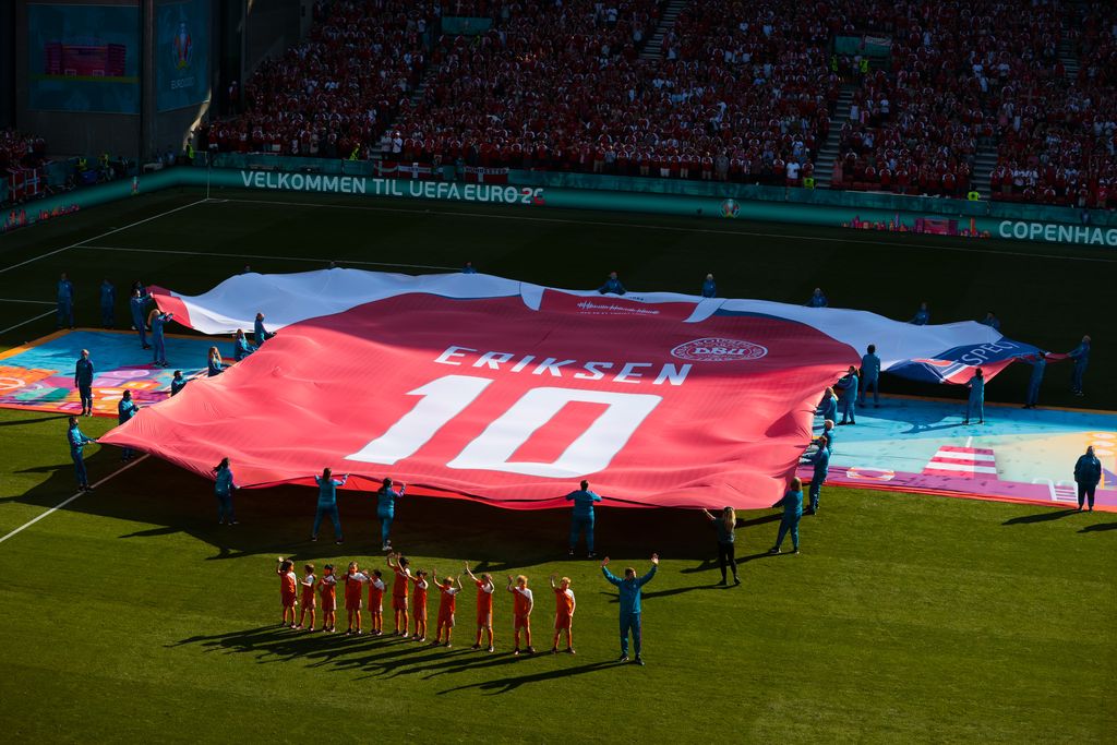 COPENHAGEN, DENMARK - JUNE 17: A large replica Denmark shirt with Christian Eriksen, Number Ten is displayed on the pitch prior to the UEFA Euro 2020 Championship Group B match between Denmark and Belgium at Parken Stadium on June 17, 2021 in Copenhagen, Denmark. (Photo by Hanna McKay - Pool/Getty Images)