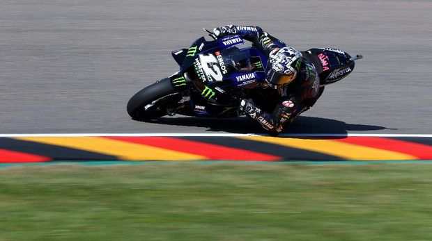 Yamaha Spanish rider Maverick Vinales steers his motorbike during the first practice session ahead of the German motorcycle Grand Prix at the Sachsenring racing circuit in Hohenstein-Ernstthal near Chemnitz, eastern Germany, on June 18, 2021. (Photo by Ronny Hartmann / AFP)