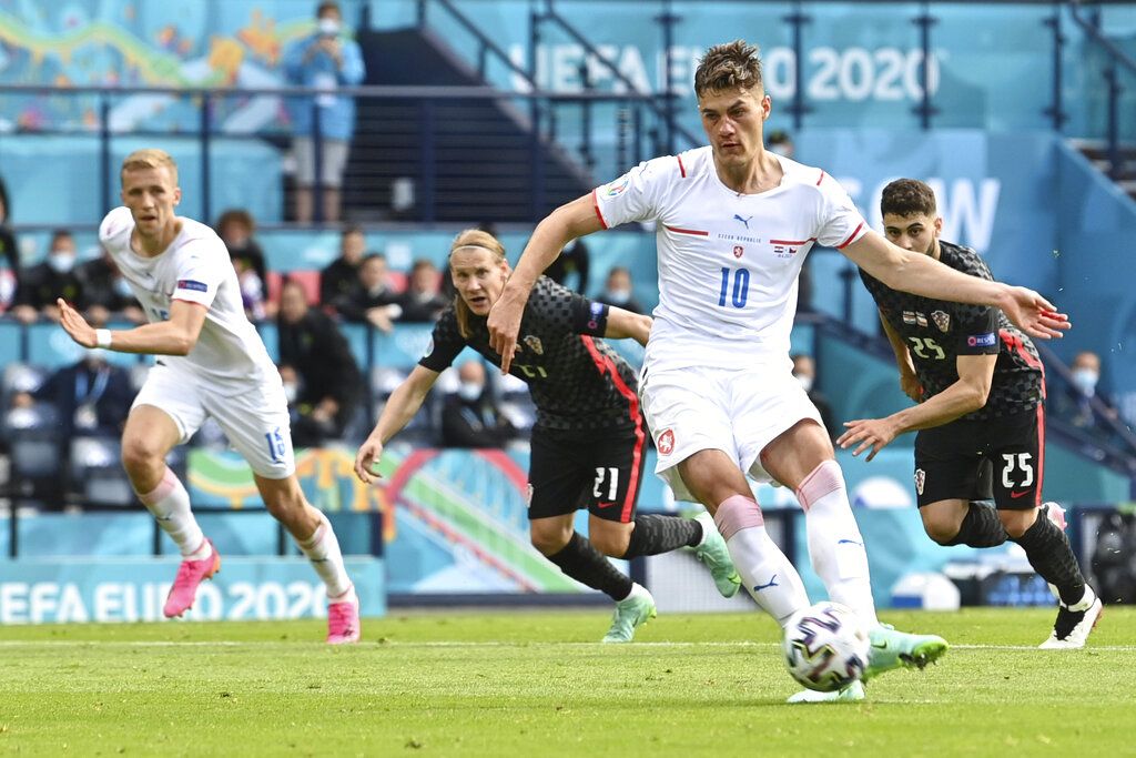 Czech Republic's Patrik Schick scores his side's first goal rom the penalty spot during the Euro 2020 soccer championship group D match between Croatia and the Czech Republic at the Hampden Park stadium in Glasgow, Friday, June 18, 2021. (Paul Ellis, Pool via AP)