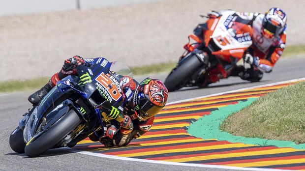 Rider Fabio Quartararo (France, Monster Energy Yamaha MotoGP) rides around the track during the Second Free Practice session. on the Sachsenring circuit in Hohenstein-Ernstthal, Germany, Saturday, June 19, 2021. (Jens Büttner/dpa via AP)