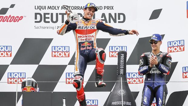 Rider Marc Marquez from Spain of the Repsol Honda Team reacts after winning the Moto GP race at the Sachsenring circuit in Hohenstein-Ernstthal, Germany, Sunday, June 20, 2021. (Jan Woitas/dpa via AP)