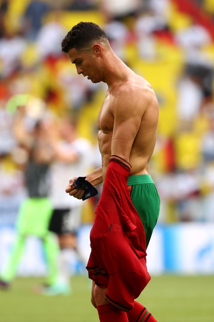 Cristiano Ronaldo MUNICH, GERMANY - JUNE 19: Cristiano Ronaldo of Portugal looks dejected following defeat in the UEFA Euro 2020 Championship Group F match between Portugal and Germany at Football Arena Munich on June 19, 2021 in Munich, Germany. (Photo by Alexander Hassenstein/Getty Images)