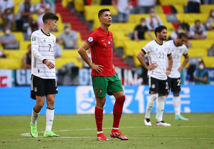 MUNICH, GERMANY - JUNE 19: Cristiano Ronaldo of Portugal looks dejected following defeat in the UEFA Euro 2020 Championship Group F match between Portugal and Germany at Football Arena Munich on June 19, 2021 in Munich, Germany. (Photo by Alexander Hassenstein/Getty Images)