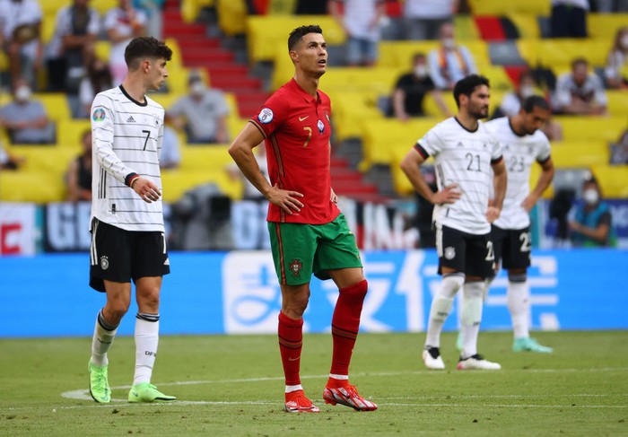 Cristiano Ronaldo MUNICH, GERMANY - JUNE 19: Cristiano Ronaldo of Portugal looks dejected following defeat in the UEFA Euro 2020 Championship Group F match between Portugal and Germany at Football Arena Munich on June 19, 2021 in Munich, Germany. (Photo by Alexander Hassenstein/Getty Images)