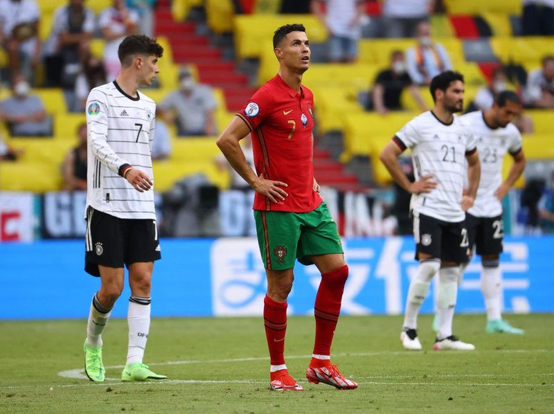 MUNICH, GERMANY - JUNE 19: Cristiano Ronaldo of Portugal looks dejected following defeat in the UEFA Euro 2020 Championship Group F match between Portugal and Germany at Football Arena Munich on June 19, 2021 in Munich, Germany. (Photo by Alexander Hassenstein/Getty Images)