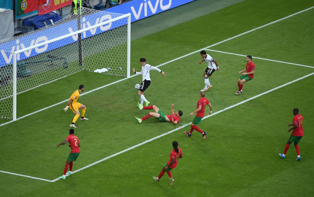 MUNICH, GERMANY - JUNE 19: Kai Havertz of Germany scores their side's third goal past Rui Patricio of Portugal during the UEFA Euro 2020 Championship Group F match between Portugal and Germany at Football Arena Munich on June 19, 2021 in Munich, Germany. (Photo by Alexander Hassenstein/Getty Images)