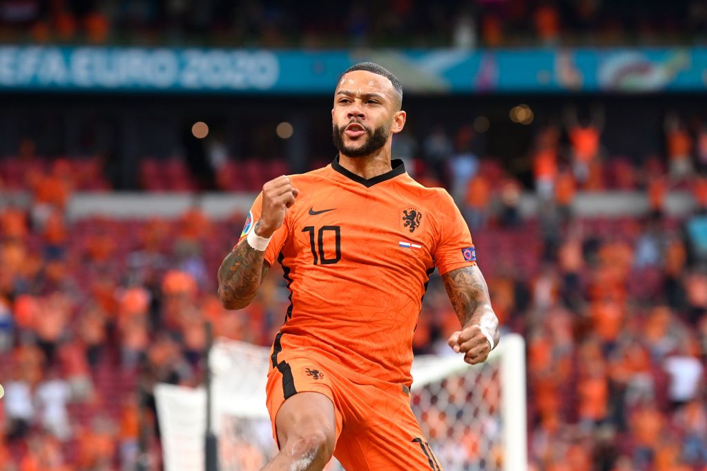 AMSTERDAM, NETHERLANDS - JUNE 17: Memphis Depay of Netherlands celebrates after scoring their side's first goal during the UEFA Euro 2020 Championship Group C match between the Netherlands and Austria at Johan Cruijff Arena on June 17, 2021 in Amsterdam, Netherlands. (Photo by Olaf Kraak - Pool/Getty Images)